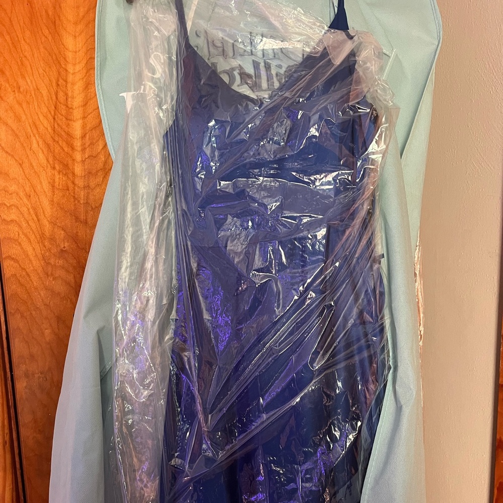 Prom dress NWT, royal blue satin with thigh slit and, pockets built in!